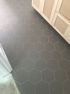 Brand new in opened been stored. Grout color for dark gray hex floor