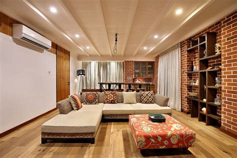 Modern Indian Living Room With Decorative Brick Wall Interior Design 