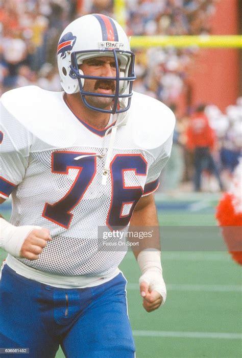Fred Smerlas Of The Buffalo Bills Runs Onto The Field Prior To News