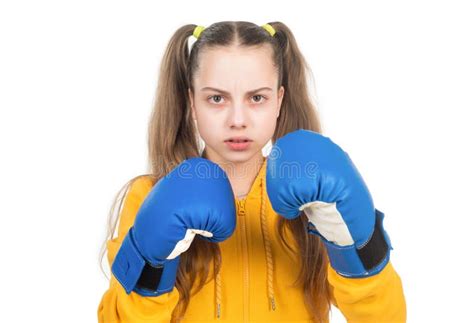 Serious Kid Boxer In Boxing Gloves Ready To Fight And Punch Isolated On