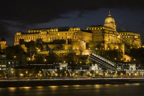 Buda Castle On The Banks Of The Danube River In Budapest At Night