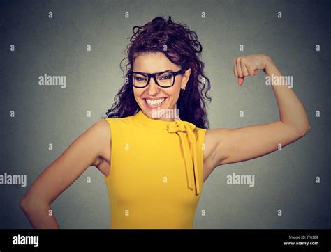 Young Woman Flexing Biceps Hi Res Stock Photography And Images Alamy
