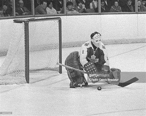Jacques Plante Of The Toronto Maple Leafs Blocks The Puck During A