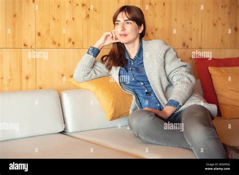 Beautiful Woman Sitting And Relaxing Stock Photo Alamy