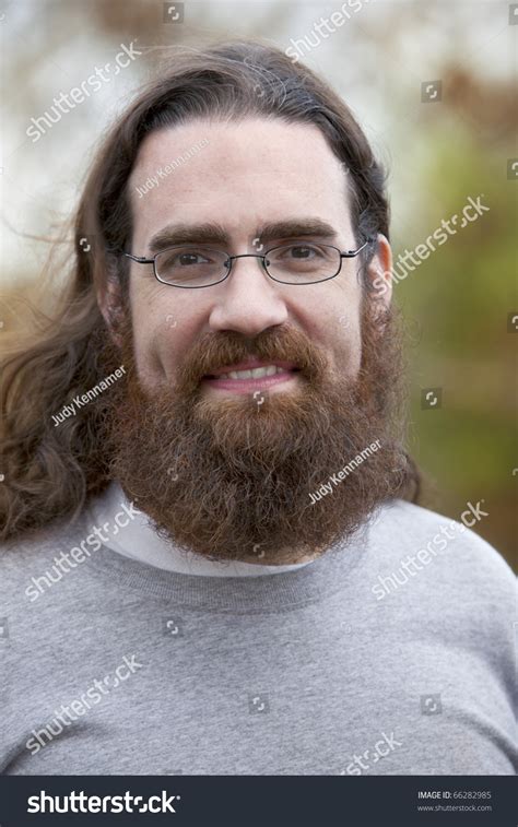 Men with long hair which combined with long beard are so sexy and handsome. Handsome Smiling Man Long Hair Beard Stock Photo 66282985 ...