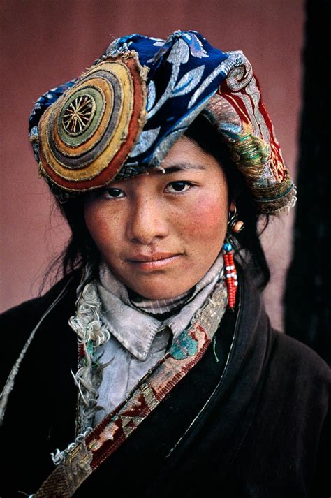 Asia Portrait Of A Tibetan Woman Wearing A Traditional Headdress
