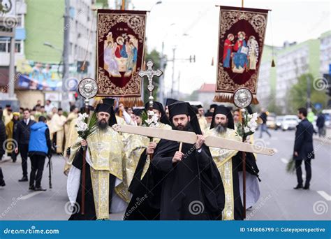Romanian Orthodox Priests During A Palm Sunday Pilgrimage Procession In