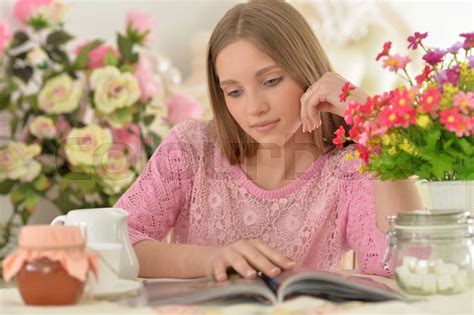 Beautiful Little Girl Reading Magazine Stock Image Colourbox