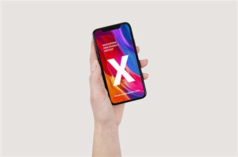 Free Iphone X Mockup In Hand Psd