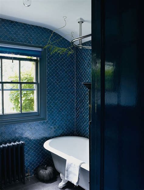 Designing a small bathroom means you'll have to be clever and purposeful with every decision, and your bathroom's tile is one of the first things you'll notice the deep royal blue vanity and wallpaper help to give the small space a more robust feel and add depth. 40 dark blue bathroom tile ideas and pictures