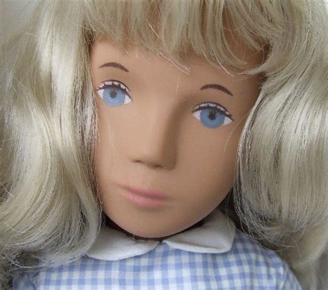 Close Up Of Later Issue Sasha Blonde Gingham Doll Showing The