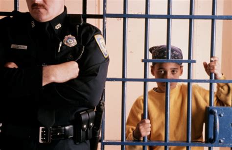 Getty Black Child Behind Bars 583x380