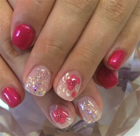 Maybe you would like to learn more about one of these? Day 50: Real and Painted Flower Nail Art - - NAILS Magazine