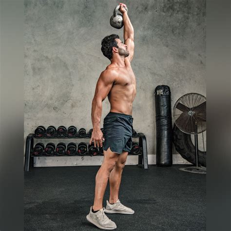 Kettlebell Turkish Getup Exercise Video Guide Muscle And Fitness