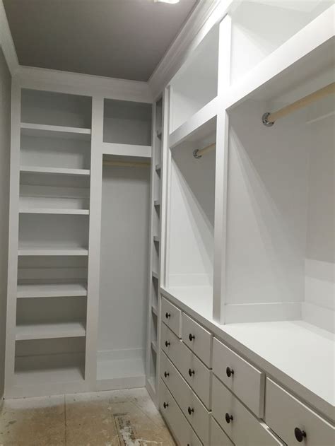 Create master bedroom storage by building a drawer with casters that easily slides underneath your bed to hide clutter out of sight. Built in closet | Do It Yourself Home Projects from Ana ...