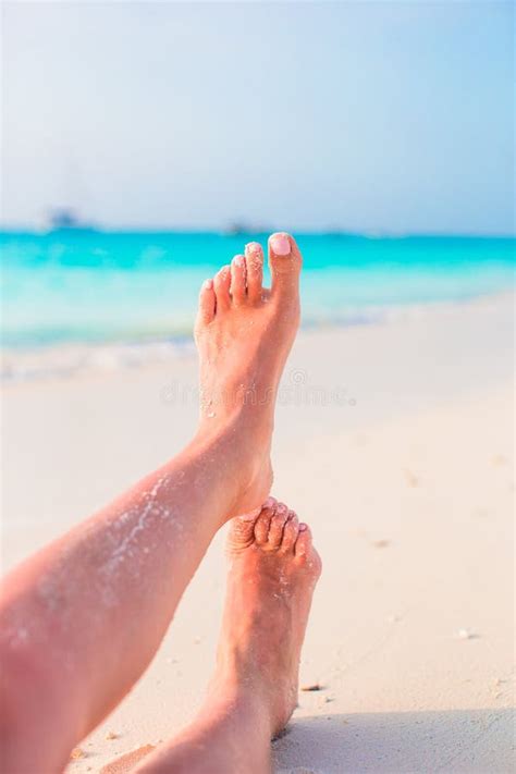 Close Up Of Female Feet On White Sandy Beach Stock Image Image Of