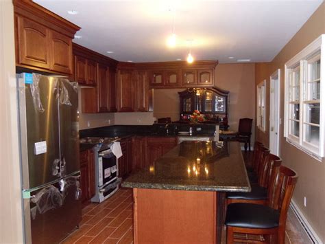 A multipurpose surface, they allow prep work, cooking, eating, working, and entertaining. Narrow Kitchen- Kitchen Island - Traditional - Kitchen ...