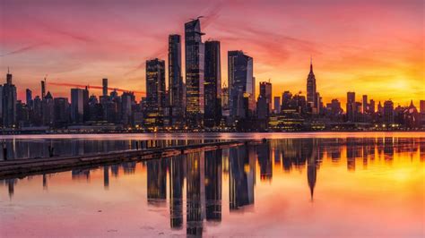 Sunset Cityscape Reflection Wallpaper Backiee