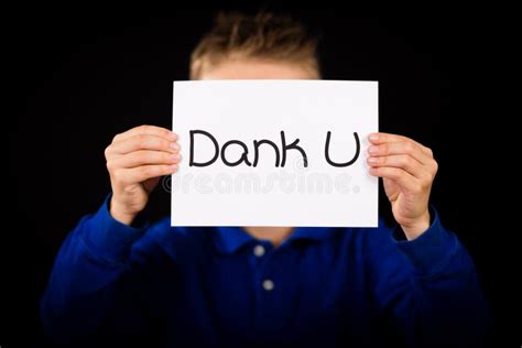 Child Holding Sign With Dutch Words Dank U Thank You Stock Photo