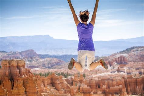 Young Woman Joyfully Jumping Bryce Canyon Park Stock Photos Free