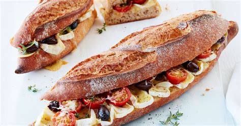 create a gourmet sandwich at home with this roast cherry tomato olive and brie baguette