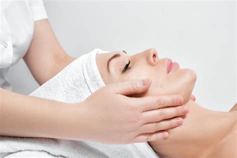 Woman Receiving Facial Massage At Spa Salon Stock Image Image Of Care Lying 105296769