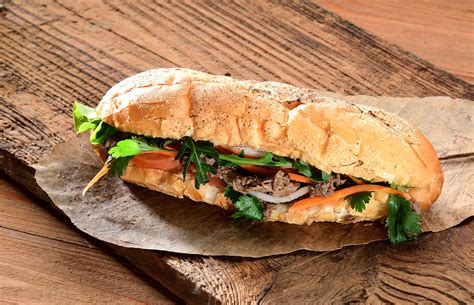 I am vietnamese and i just would like to say that 'banh mi' is literally translated as 'sandwich.' so when you say 'banh mi sandwich ' you're saying 'sandwich sandwich.' i do admire your own rendition of it though! Pork Banh mi - フォーブラザーズ | PHO BROTHERS