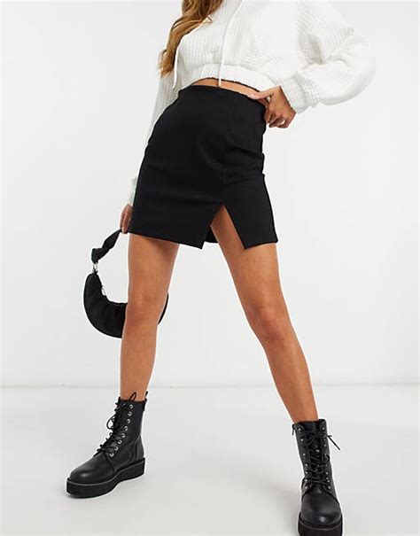 stradivarius mini skirt with split hem in black asos