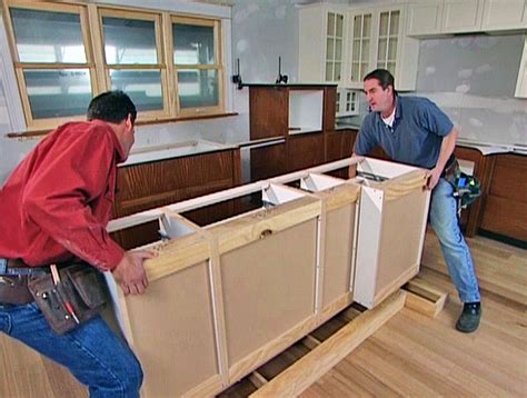 How to install a cabinet skin using adhesive spray. DIY Kitchen Cabinet Ideas & Projects | DIY