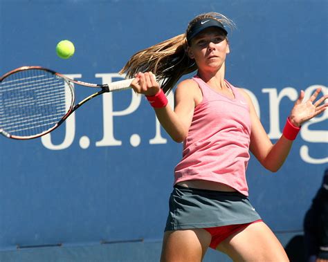 Travelling the world to hit a fluffy yellow thing. File:Katie Boulter at the 2013 US Open 2.jpg - Wikimedia ...