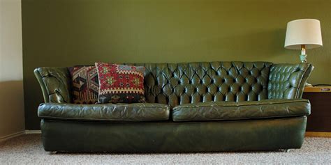 Found: Vintage Tufted Green Leather Sofa - The Gathered Home Enjoy free shipping on most stuff, even big stuff.