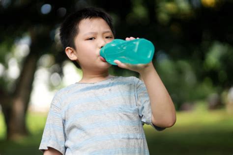 1700 Thirsty Boy Drinking Water Stock Photos Pictures And Royalty Free
