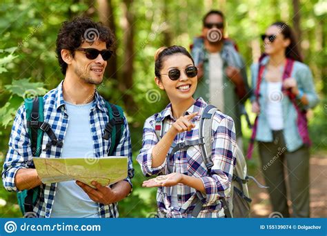 Continue hiking from upper peirce reservoir and you'll find yourself surrounded by the dense forests of lower pierce reservoir park. Friends With Map And Backpacks Hiking In Forest Stock ...