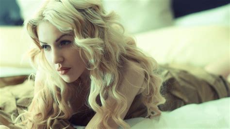 wallpaper women blonde long hair blue eyes glasses green lying on front curly hair