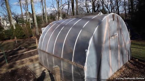 Diy high tunnels for extending your growing season #gardening #diy. 1 Year Later: Homemade Greenhouse Hoop House High Tunnel PVC Polytunnel Raised Planter Beds ...