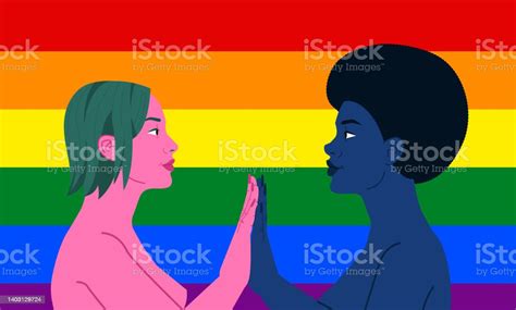 Biracial Lesbian Couple Holding Hands In Front Of The Traditional Gay