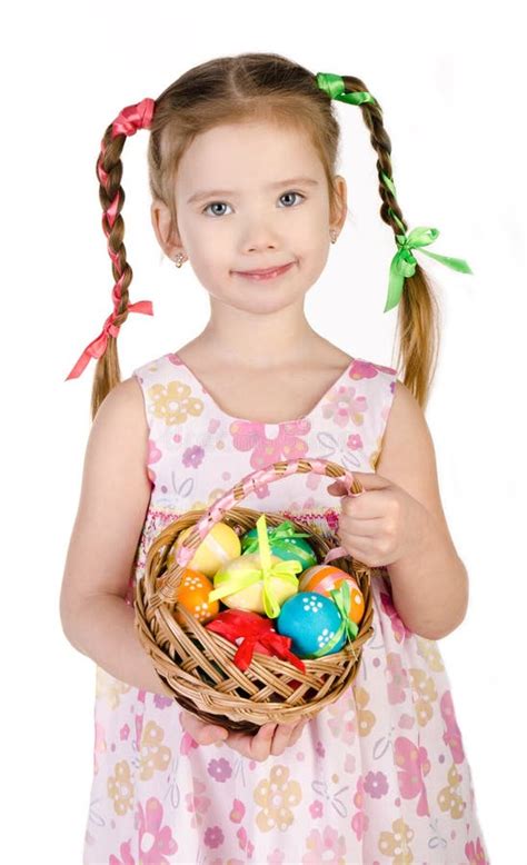 Smiling Little Girl With Basket Full Of Colorful Easter Eggs Iso Stock