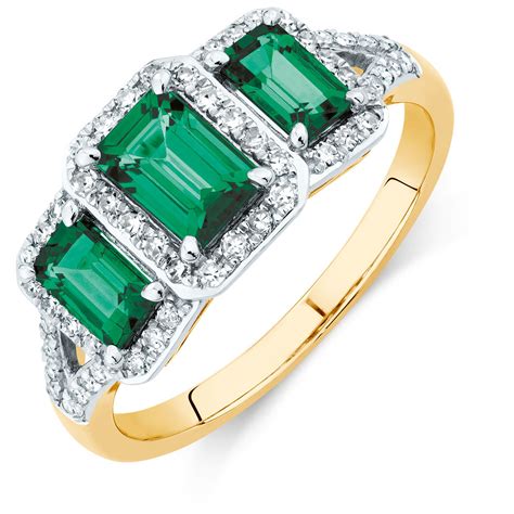 Three Stone Ring With Created Emerald And 14 Carat Tw Of Diamonds In