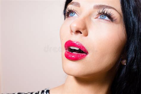 Closeup Portrait Of Beautiful Tempting Brunette Young Woman With Blue