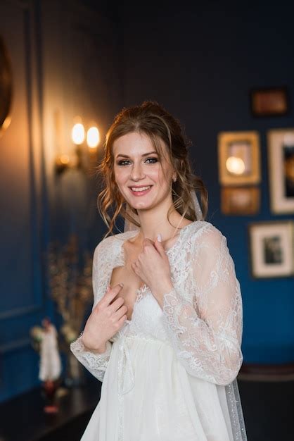 Premium Photo Beautiful Bride In White Lace Lingerie Sitting In A
