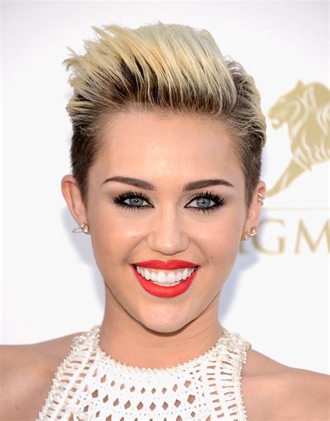Styling Her Rocker Hair In A Slicked Back Pompadour Miley Cyrus Get