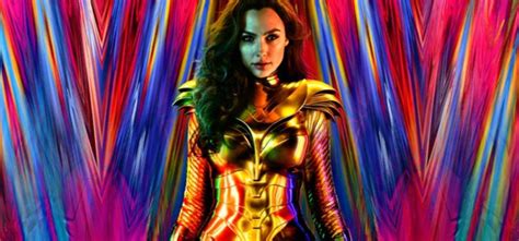 Gal Gadot Unveils Wonder Womans Fiery Golden New Look Dc Fans Are