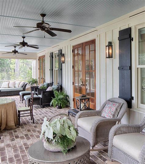 Wood French Style Front Doors With A Covered Porch Lots Of Seating
