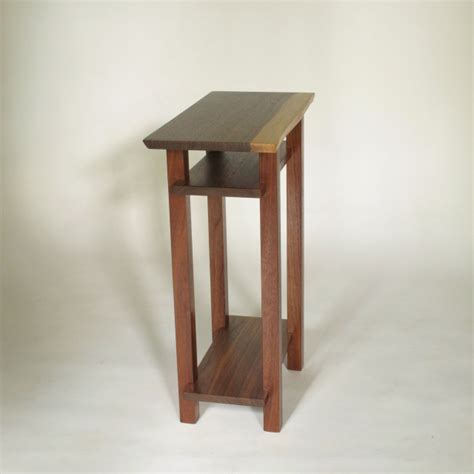 It's flat but it has sides, which create a shallow bowl. Modern, wood coffee table and end tables. Coffee tables ...