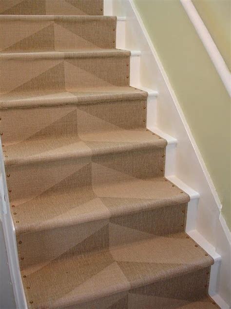It works best for a shorter wall if the stairs are broken up into 2 sections. loft & cottage: diy nailhead stair runner | Diy stairs, Ikea rug, Home