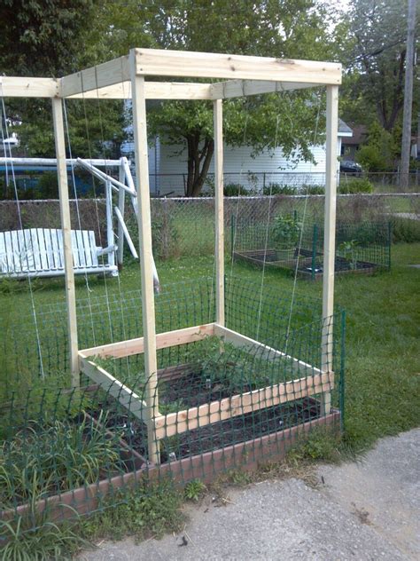 This is the first phase of my 36′ long tomato trellis or permanent tomato cage structure. Tomato Trellis v2 (2012) (With images) | Tomato trellis ...