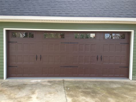 Steel Recessed Panel Dark Wood Grain Carriage House Garage Door With