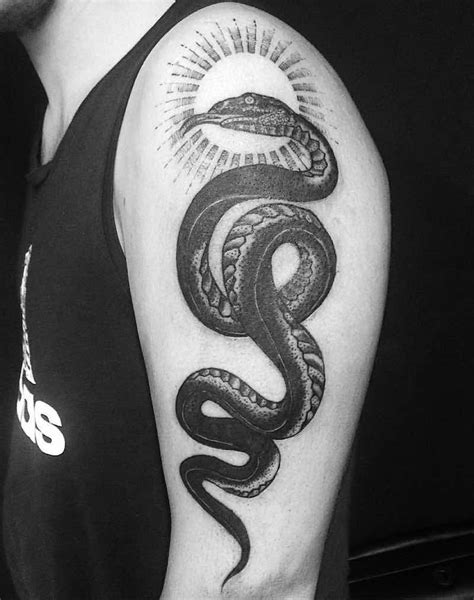 Best Snake Tattoos Tattoo Insider Snake Tattoo Snake Tattoo Design