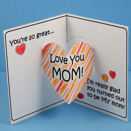 It's 2 inches long, so cut out a little 2x2 inch square, fold it in half on the diagonal and cut it out like you would a heart. Make Mother's Day Pop-Up Card - Mother's Day Crafts - Aunt Annie's Crafts