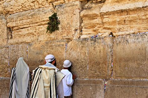 Reciting A Brief Prayer At The Wailing Wall In Jerusalem Israel